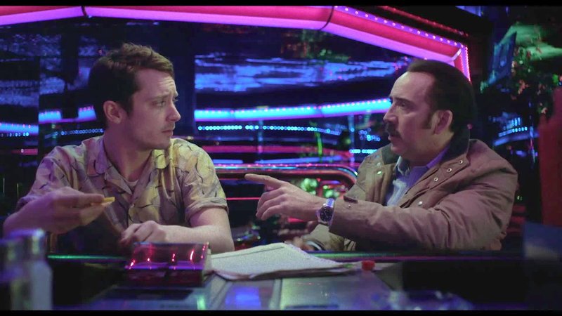 on the right Stone (Nicolas Cage), on the left Waters (Elijah Wood) – Bild: Film 1 Action on the right Stone (Nicolas Cage), on the left Waters (Elijah Wood) – Bild: Film 1 Action