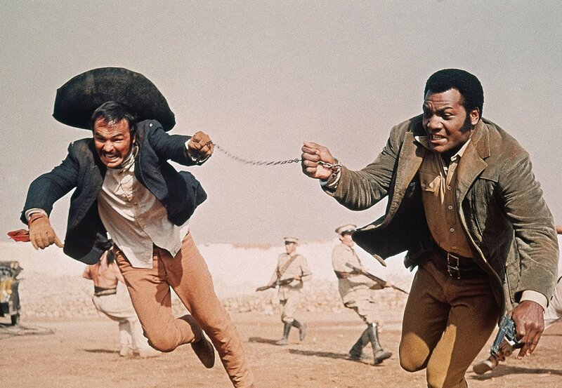 Lyedecker (Jim Brown, rechts) und Yaqui Joe Herrera (Burt Reynolds) gelingt die Flucht vor General Verdugo. – Bild: WDR/​WDR/​Telepool