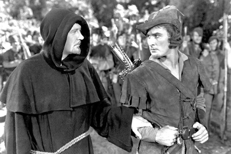 Der verkleidete König Richard Löwenherz (Ian Hunter, li.) und Robin Hood (Errol Flynn, re.), als sie in Sherwood Forest aufeinandertreffen – Bild: arte Der verkleidete König Richard Löwenherz (Ian Hunter, li.) und Robin Hood (Errol Flynn, re.), als sie in Sherwood Forest aufeinandertreffen – Bild: arte