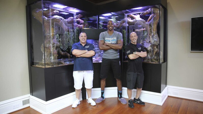 Wayde, Brett and Dwight strike a pose with the tank. – Bild: Animal Planet