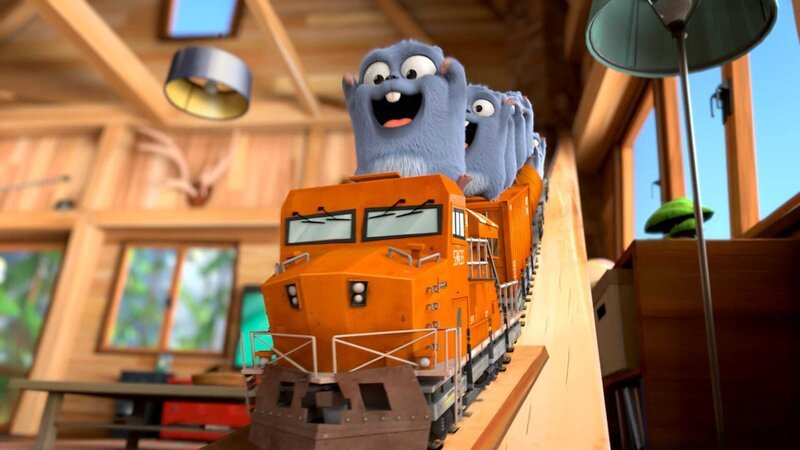 Die Lemminge haben aus einer Modelleisenbahn eine Achterbahn gebaut und vergnügen sich damit in der Rangerhütte. Doch die Freude ist nur von kurzer Dauer. Schon bald erscheint Grizzy, dem der Lärm gar nicht gefällt. – Bild: BOME