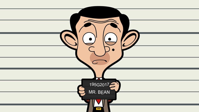 Auf der Polizeiwache merkt der zerknirschte Mr. Bean, dass ein Foto von ihm gemacht wird. Ob er das für seinen Ausweis gebrauchen kann? – Bild: Boomerang (DE) /​ Tiger Aspect Productions 2014 Ltd