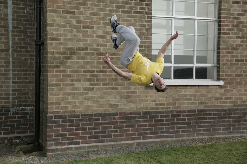 ESSEX, ENGLAND – Ashley Holland performs a parkour wall backflip.  (photo credit: IWC Media/​Nick Marwick) – Bild: Copyright © The National Geographic Channel.
