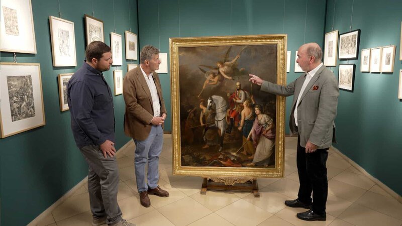 Ronald Graf, Karl Hohenlohe, Alexander Strasoldo begutachten ein Gemälde das Malers Ferracuti. – Bild: ORF/​Clever Contents