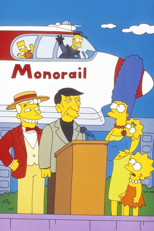 Die Einschienenbahn wird von Mr. Lanley (l.) und Leonard Nimoy (2.v.l.) eingeweiht. Marge (3.v.r.), Lisa (r.), Bart (oben l.) und Maggie (2.v.r.) sind mächtig stolz auf Homer, der den Job als Zugführer angenommen hat. – Bild: und TM Twenthieth Century Fox Film Corporation – Alle Rechte vorbehalten Lizenzbild frei