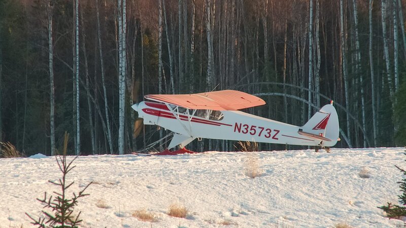 Piper Cub sits in snow. – Bild: Discovery Communications