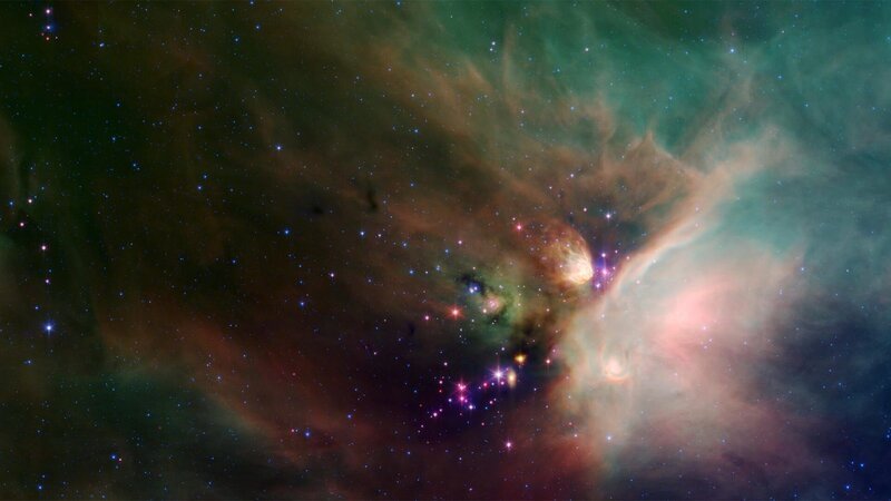 Auf diesem Bild treten neu entstandene Sterne aus einem Schleier von Sternenstaub und Gesteinsbrocken hervor. Auch unsere Sonne entstand aus interstellarer Materie – den Überresten einer Supernova-Explosion. – Bild: N24 Doku