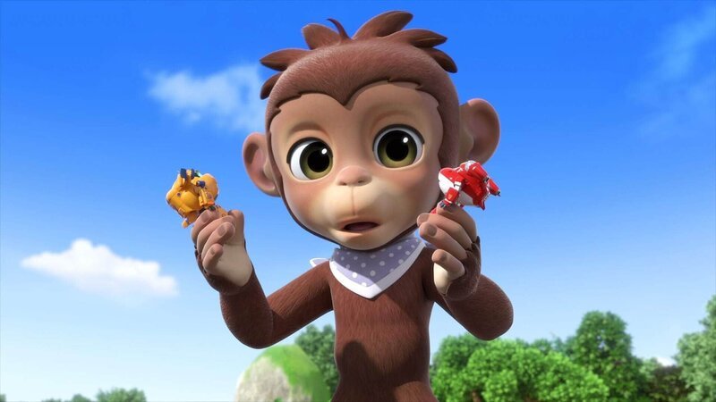 Als das Orang-Utan-Baby Tan mit den Knöpfen von Jetts (re.) Kommunikator spielt, löst er aus Versehen einen Supercharge aus, der ihn zu einem riesigen Orang-Utan wachsen lässt. – Bild: 2021 FUNNYFLUX /​ ALPHA ALL RIGHTS RESERVED