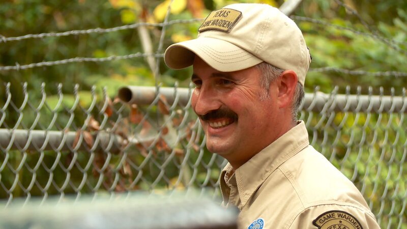 Trent Herchman is smiling. – Bild: Animal Planet /​ Discovery Communications