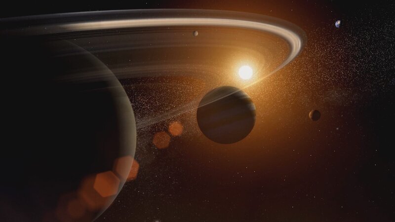 Shot of Saturn in front of frame, Jupiter in the centre and the rocky planets and Sun in the background – GFX – Bild: Discovery Communications