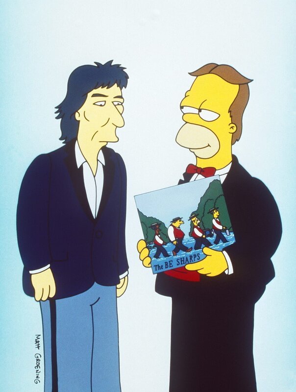 Damals hatte Homer (r.) zusammen mit Rektor Skinner, Apu und Barney als „Barbershop-Quartett“ den Grammy gewonnen und von George Harrison (l.) überreicht bekommen. – Bild: und TM Twenthieth Century Fox Film Corporation – Alle Rechte vorbehalten Lizenzbild frei