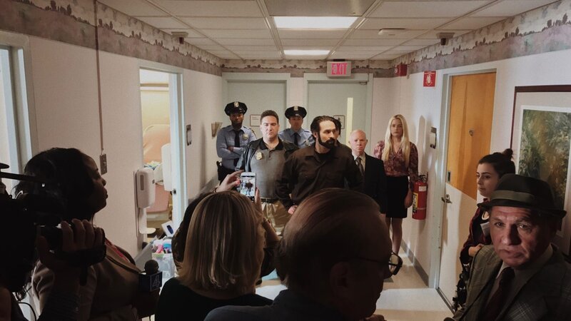 Ralph Friedman, Sgt. Taylor, and others prepare to roll on Ralph’s press conference scene. – Bild: Discovery Communications