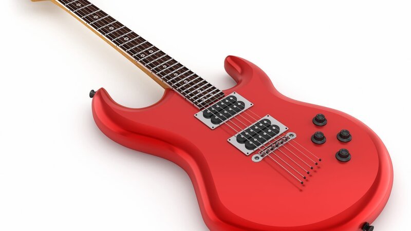 Red electric guitar isolated on white with soft shadows. – Bild: adventtr /​ Getty Images /​ E+ /​ adventtr