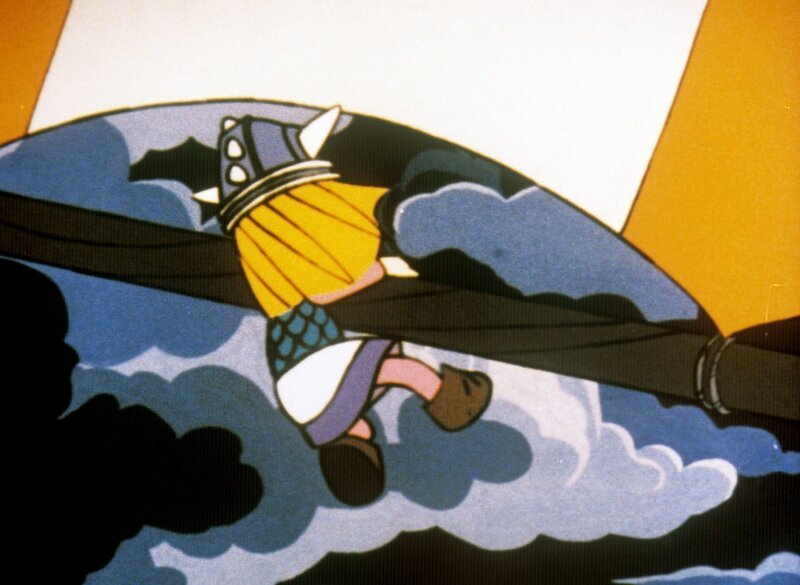 Nachdem das Wikingerschiff in einen heftigen Sturm geraten ist, wird Wickie von eine Bö ergriffen und am Mastbaum mit einem Segel durch die Luft davon getragen. – Bild: ORF/​Apollo Filmverleih