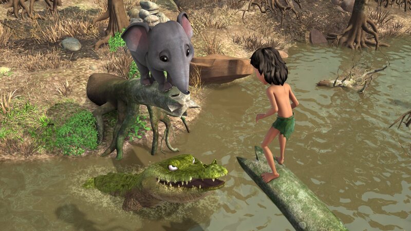 Jakala (Mi.), das Krokodil, hat Mogli (re.) und dem kleinen Elefanten Rudi (li.) den Weg über den Baumstamm abgeschnitten. Jakala hat Hunger auf die Beiden. – Bild: ZDF und (c) DQ Entertainment/​(c) DQ Entertainment