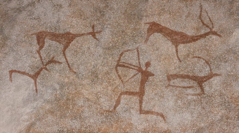 Drawing in a cave painted by an ancient man on a wall, a rock. Paints red ocher. Hunting for an animal., Neanderthal, cave man. The Stone Age, the Ice Age. Science, anthropology. – Bild: Shutterstock /​ Shutterstock /​ Copyright (c) 2017 GAS-photo/​Shutterstock. No use without permission.