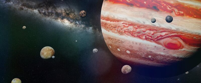 Planet Jupiter with some of the 69 known moons with the Milky Way galaxy (3d space illustration, elements of this image are furnished by NASA) – Bild: Shutterstock