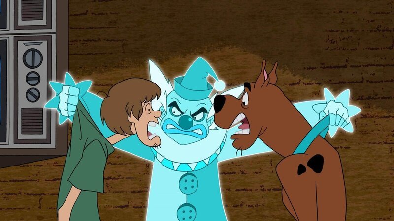Shaggy und Scooby-Doo sind auf der Flucht vor Pazzo dem Geisterclown, der bei QTTTV sein Unwesen treibt. – Bild: & ™ Warner Bros. Entertainment Inc.