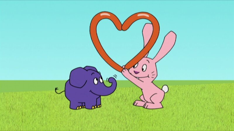 Hase und Elefant basteln ein Herz. – Bild: WDR