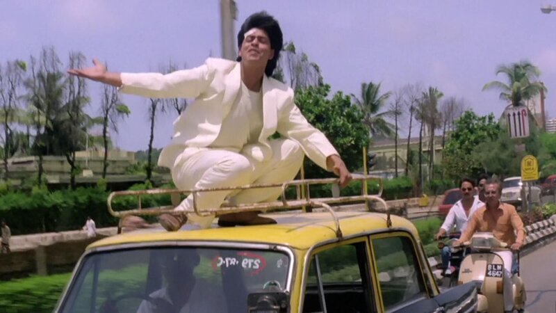 Vijay Agnihorti (Shah Rukh Khan)  Die Verwendung des sendungsbezogenen Materials ist nur mit dem Hinweis und Verlinkung auf RTL+ gestattet.; Vijay Agnihorti (Shah Rukh Khan)  Die Verwendung des sendungsbezogenen Materials ist nur mit dem Hinweis und Verlinkung auf RTL+ gestattet. – Bild: RTL /​ Bolly Love