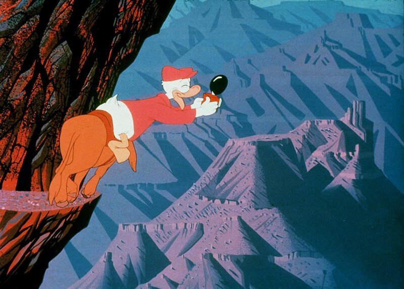 Donald erklimmt das Gebirge. Von dort aus kann er die besten Schnappschüsse machen. – Bild: Disney Channel