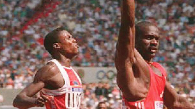 Key Art mit Carl Lewis (l.) und Ben Johnson zu „9,79 – Das schmutzigste Rennen aller Zeiten“. – Bild: GEO Television Key Art mit Carl Lewis (l.) und Ben Johnson zu „9,79 – Das schmutzigste Rennen aller Zeiten“. – Bild: GEO Television