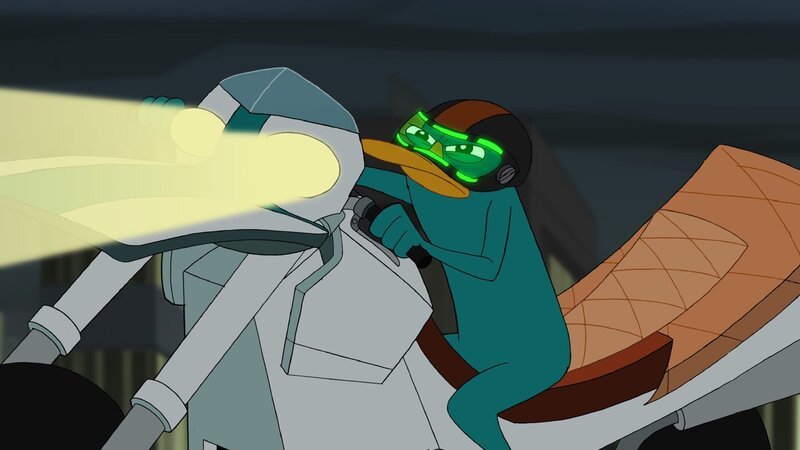 PHINEAS AND FERB – „Sidetracked“ – Agent P teams up with a former partner, a human agent named Lyla, to stop a hijacked train running along the US/​Canadian border.  In a past mission, they had a falling out, so Agent P must decide whether or not he can trust Lyla and her unique sense of logic to get them through the mission, defeat Doofenshmirtz and save the train’s passengers and Canada’s national treasure – a moose named Albert. This episode of „Phineas and Ferb“ premieres Friday, March 1 (9:00 p.m., ET/​PT) on Disney Channel. (DISNEY CHANNEL) PERRY THE PLATYPUS – Bild: 2013 Disney Enterprises, Inc. All rights reserved.
