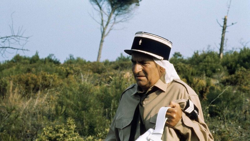 Gendarm Ludovic Cruchot (Louis De Funès) – Bild: TVNOW Gendarm Ludovic Cruchot (Louis De Funès) – Bild: TVNOW