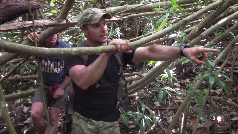 Cody and Joe walking through brush. – Bild: Discovery Communications