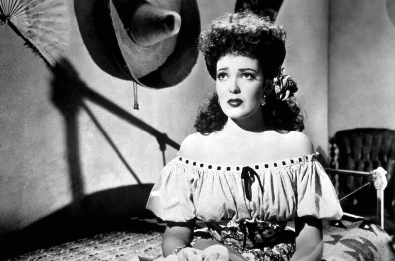Chihuahua (Linda Darnell) fürchtet um ihr Verhältnis zu Doc Holliday, als seine ehemalige Verlobte Clementine Carter in Tombstone auftaucht. – Bild: Twentieth Century Fox Film Corporation Chihuahua (Linda Darnell) fürchtet um ihr Verhältnis zu Doc Holliday, als seine ehemalige Verlobte Clementine Carter in Tombstone auftaucht. – Bild: Twentieth Century Fox Film Corporation