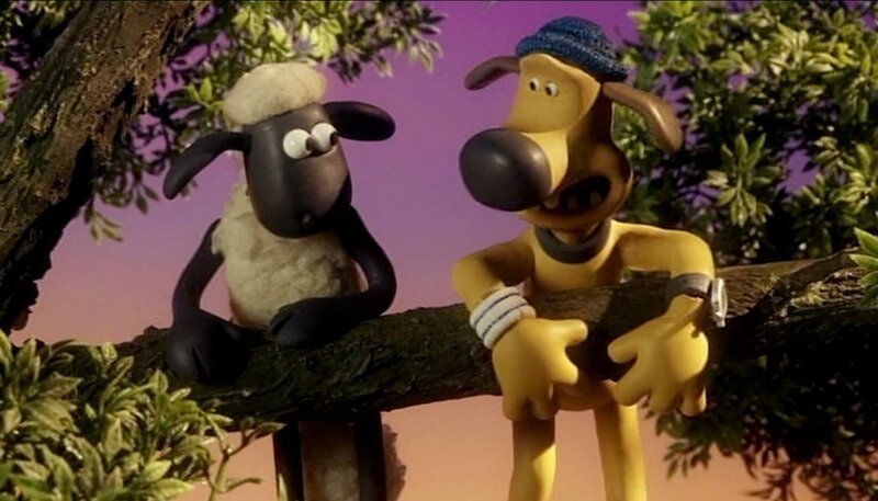 Shaun und Bitzer besprechen einen Plan, wie sie sich die Kokosnuss öffnen können. – Bild: Aardman Animations Ltd.