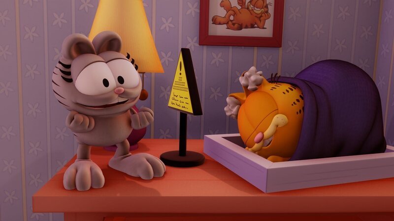 Garfield hält Winterschlaf und bekommt nichts von der Party mit, die Nermal in Jons Haus veranstaltet. – Bild: HR/​DARGAUD MEDIA