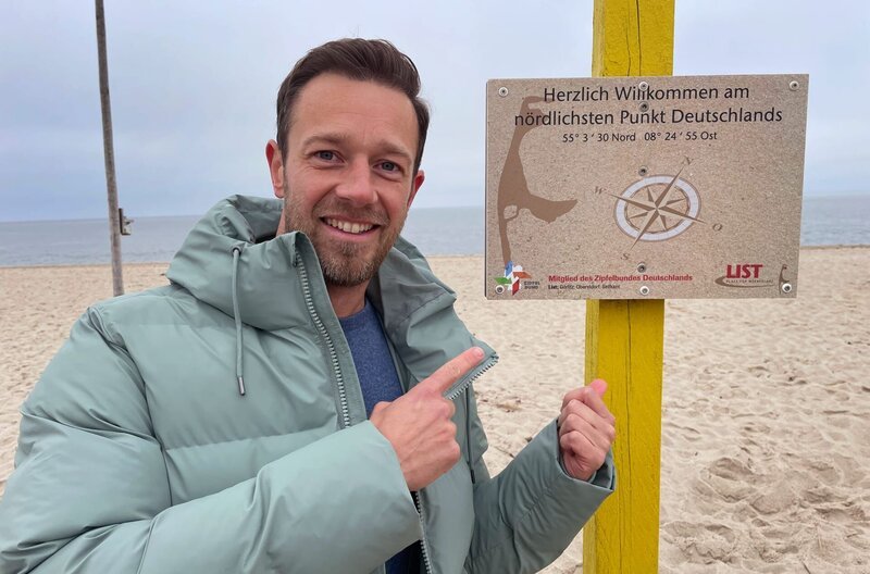 Arnd Reisenbichler am nördlichsten Punkt Deutschlands auf der deutschen Insel Sylt. – Bild: SWR