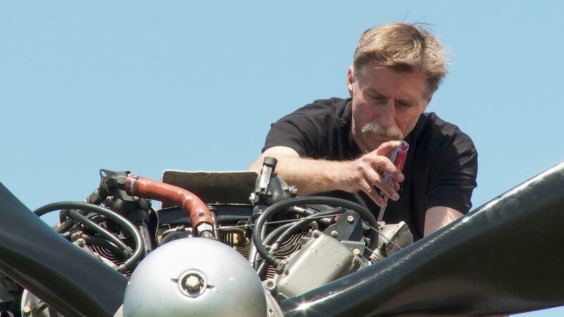 Kevin Lacey works on plane. – Bild: - Promote program, network, DCL, & DCL affiliated businesses in all media throughout the world in perpetuity