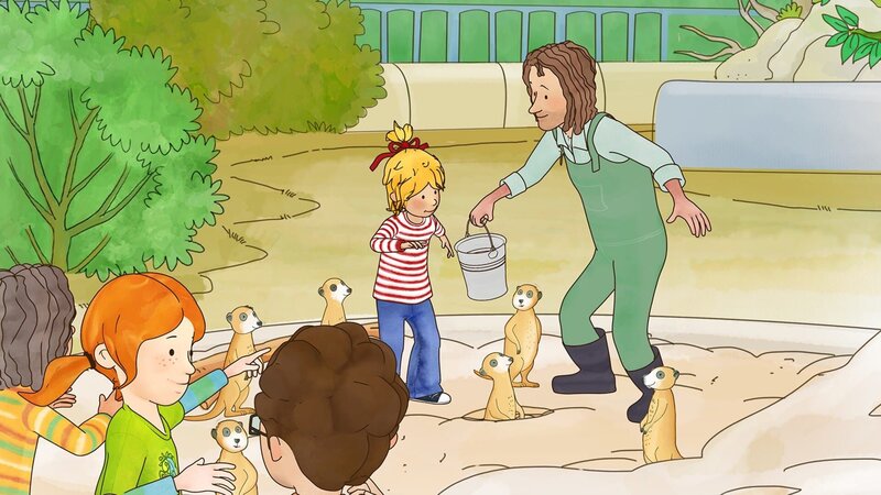 Was fressen wohl Erdmännchen? Und wo kommen sie ursprünglich her? Geduldig beantwortet der Zoowärter die Fragen Connis und ihrer Kindergartenfreunde. – Bild: ZDF/​Henning Windelband/​Youngfilms GmbH