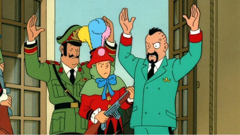 Tim (M.) überfällt an Karneval Oberst Sponsz (r.) und General Alvarez (l.) in Tapiocapolis, um entschlossen seinen riskanten Plan zu verfolgen. – Bild: ZDF und Ellipsanime/​France 3/​M6/​Nelvana