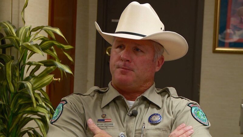 Bryan Callihan sitting down with his arms crossed. – Bild: Animal Planet /​ Discovery Communications, LLC