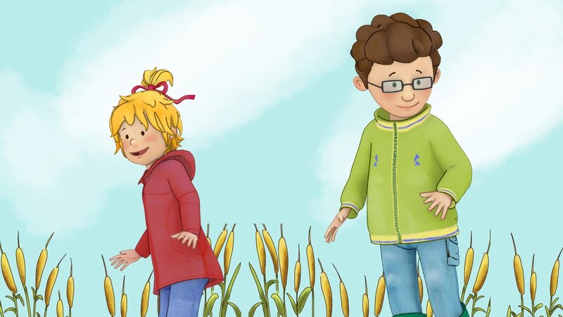 Conni und Simon suchen im Schilf nach Fröschen. – Bild: ZDF/​Henning Windelband/​Youngfilms GmbH