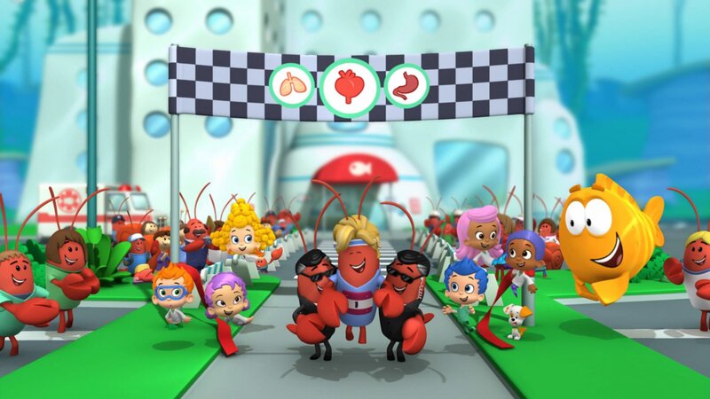 Vorne: Nonny (3.v.l.), Oona (4.v.l.), Deema (5.v.l.), Lobster Body Guards, The Mayor (m.), Gil (6.v.r.), Molly (5.v.r.), Bubble Puppy (4.v.r.), Goby (3.v.r.), Mr. Grouper (2.v.r.). – Bild: Paramount