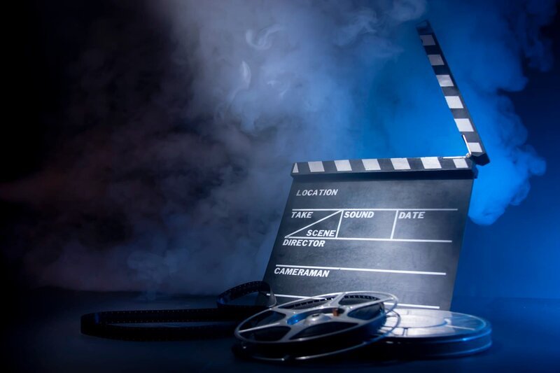 Movie clapper and film reels – Bild: Fernando Gregory