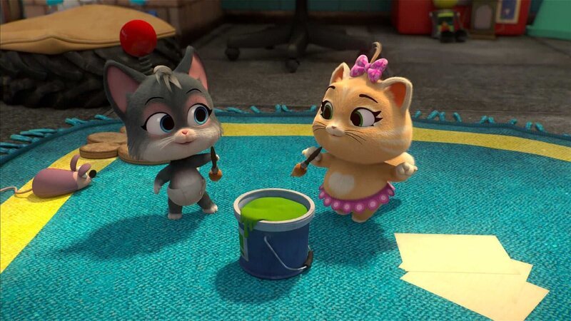 Weil Pilou versehentlich ein Instrument der Buffycats beschädigt hat, machen sich die Freunde auf zum Schrottplatz, wo Magnus das Instrument reparieren soll. Hier trifft Pilou auf die quirlige Katze Minimi. – Bild: Rainbow S.r.l. /​ Ein neuer Freund für Pilou