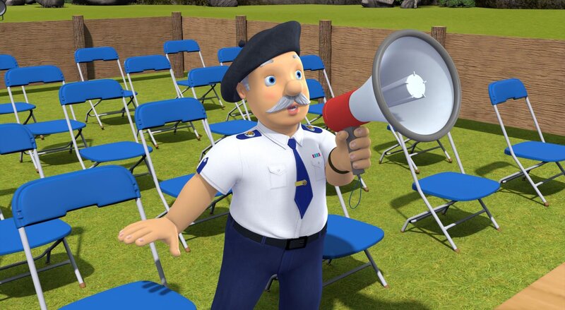 Hauptfeuerwehrmann Steele inszeniert als Regisseur ein Musical über den großen Brand in der Kohlenlagerhalle. – Bild: KiKA/​Prism Art & Design Limited