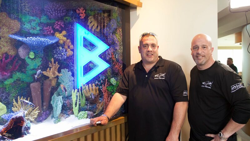 Wayde King and Brett Raymer pose with Marshawn Lynch’s Beastmode tank. – Bild: Anthony Lindsey /​ Animal Planet /​ Discovery Communications, Inc.