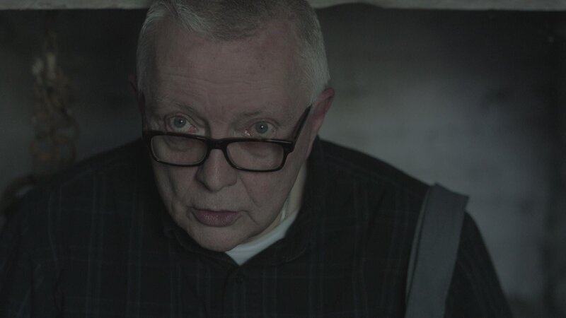 Psychic medium Chip Coffey reading the cell in the dungeon where inmates were beaten and chained to the wall at the former Greene County Almshouse. – Bild: TLC