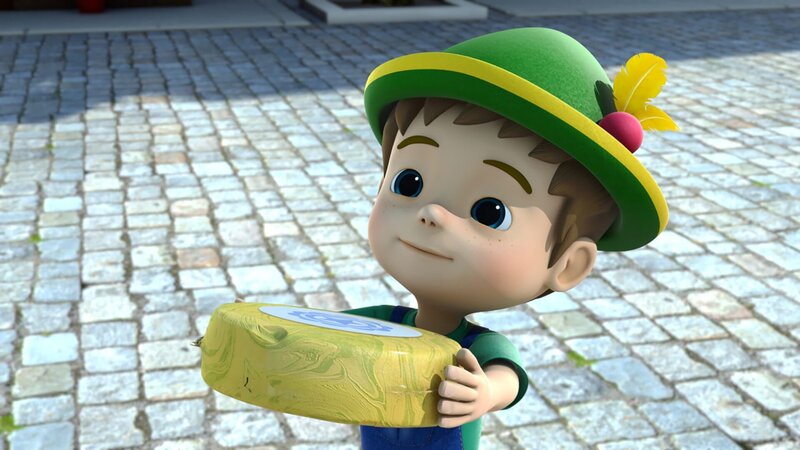 Urs mit einem selbstgemachten Käselaib. – Bild: KiKA/​FunnyFlux/​QianQi/​EBS/​CJ E&M