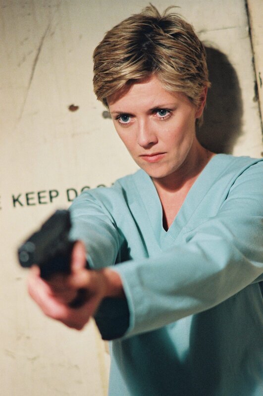 Wird Carter (Amanda Tapping) dem Multimillionär helfen, ein Goa’Uld zu werden? – Bild: AXN Sci-fi