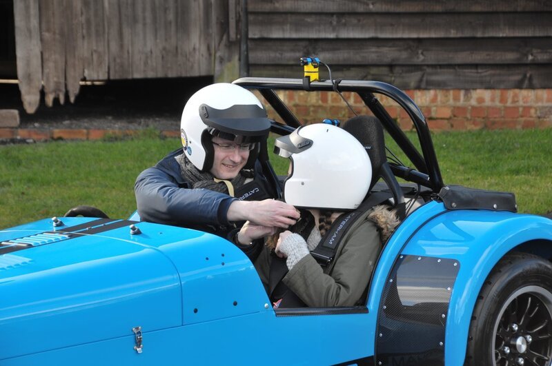 Photograph of nominee Jason in his newly restored Caterham 7, pictured with his daughter. – Bild: National Geographic/​Stuart Readfern