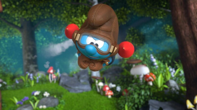 Handy braust mit seinem Raketenrucksack durch den Wald, um Hefty zu suchen. – Bild: KiKA/​Peyo Productions, Dupuis Édition & Audiovisuell 2020