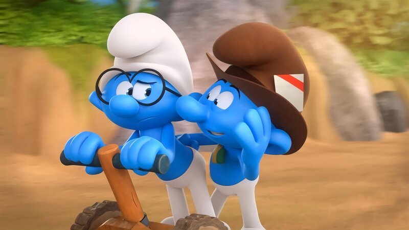 Zusammen mit Schlaubi entwickelt Reporter einen Plan, um Jokey und Poeti eins auszuwischen. – Bild: KiKA/​Peyo Productions, Dupuis Édition & Audiovisuell 2020