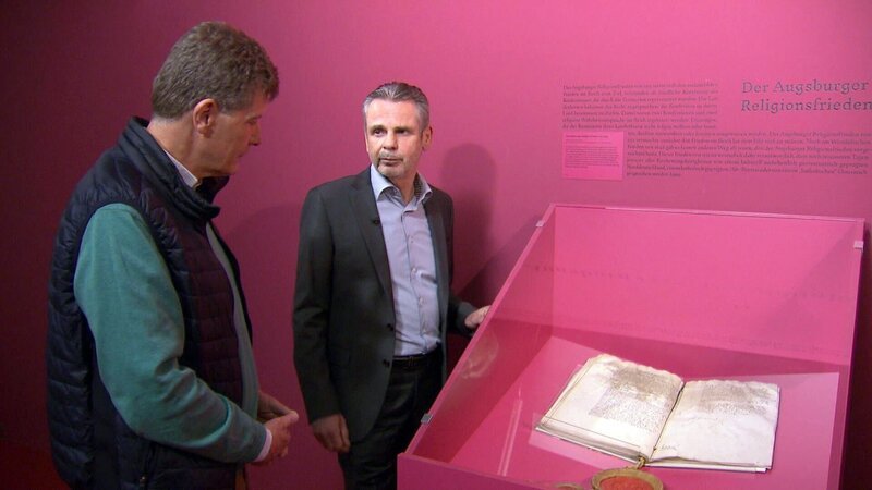 Karl Hohenlohe, Walter Oehlinger; Ausstellung: Brennen für den Glauben. – Bild: ORF/​Clever Contents